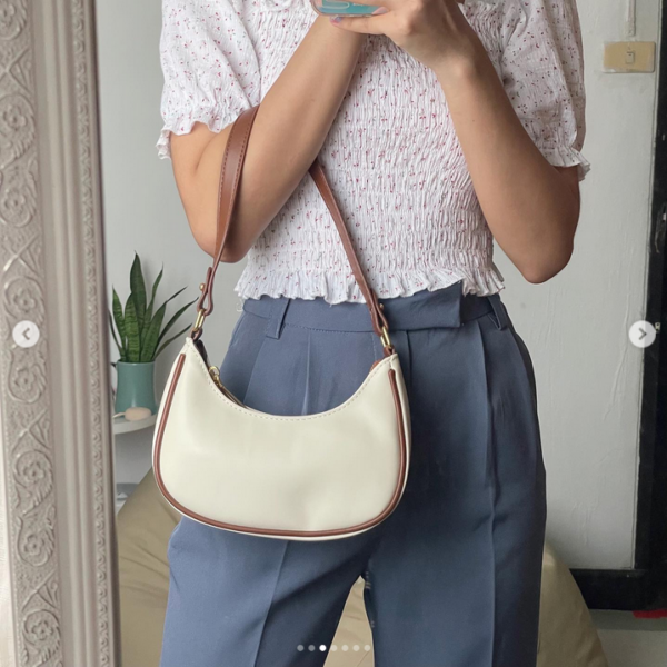 Screenshot-2025-07-10-at-16-52-02-Instagram.png Women’s Crescent Underarm Bag Summer 2025